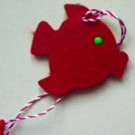 Martisor peste rosu din fetru / pasla